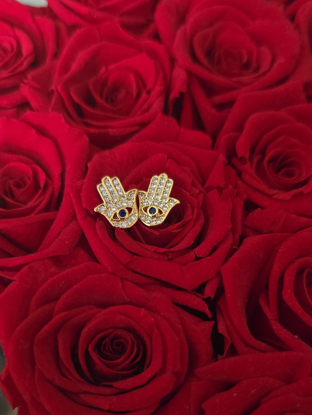 Gold Hamsa Stud Earrings with Clear Crystals and Blue Accent